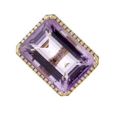 Lot 58 - An 18ct gold amethyst and diamond cluster cocktail ring