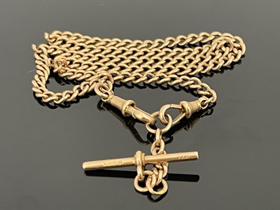 Lot 10 - A 9 carat gold watch chain, fob links and T...