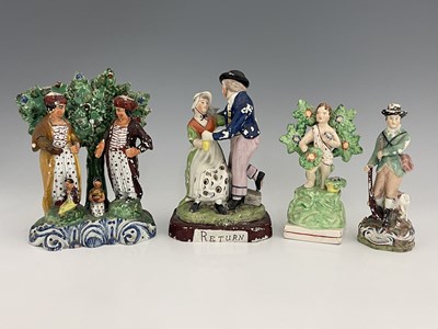 Lot 1028 - Four Staffordshire figures, including Return,...