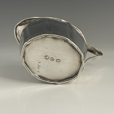 Lot 108 - An eighteenth-century Irish silver cream or...