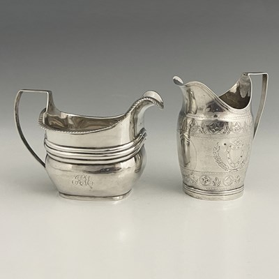 Lot 404 - A George III silver cream jug, of ovoid form,...