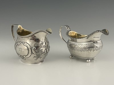 Lot 405 - A George III silver cream jug, of squat ovoid...