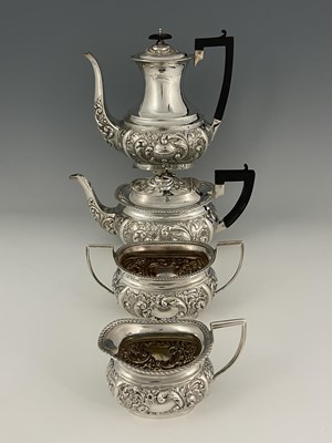 Lot 411 - A George VI silver four-piece tea and coffee...