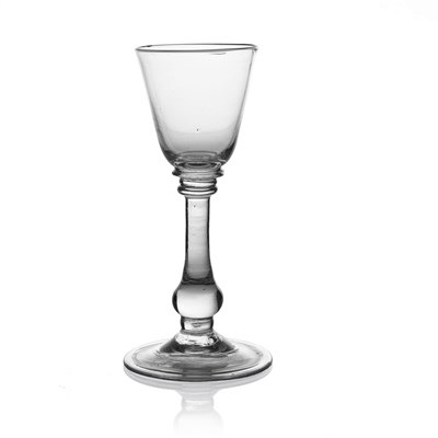 Lot 451 - A Lightweight Baluster wine glass, circa 1725,...