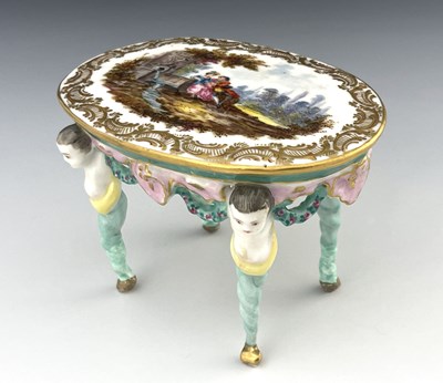 Lot 643 - A 19th century Dresden porcelain model table,...