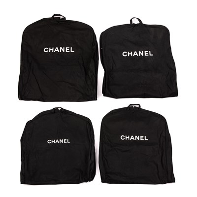 Lot 315 - Chanel, four garment bags, crafted from back...