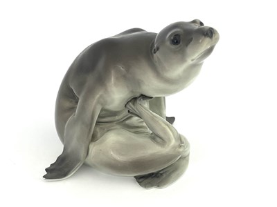 Lot 647 - KPM Berlin, a figure of a sea lion, modelled...