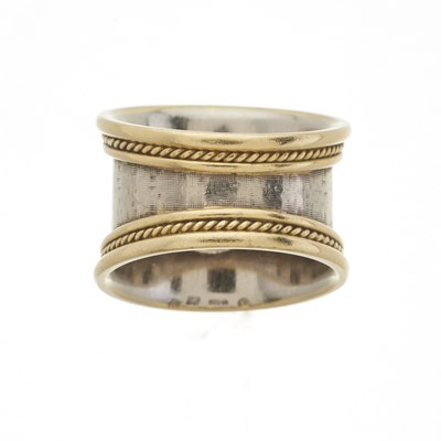 Lot 111 - Elizabeth Gage, an 18ct gold diamond single-stone band ring