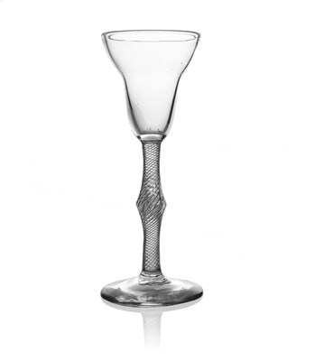 Lot 447 - An air twist wine glass, circa 1760, the pan...