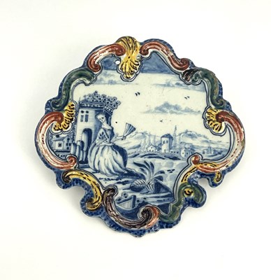 Lot 627 - A Dutch Delft polychrome wall plaque, circa...