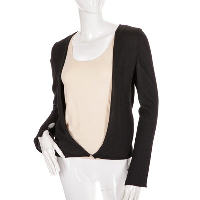 Lot 312 - Chanel, a black cashmere cardigan, featuring...