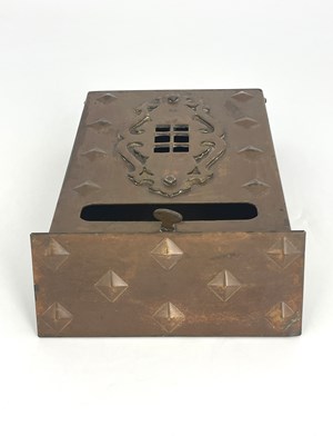 Lot 127 - An Arts and Crafts copper letter box, repousse...