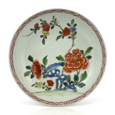 Lot 604 - A Chinese famille rose dish or large saucer,...