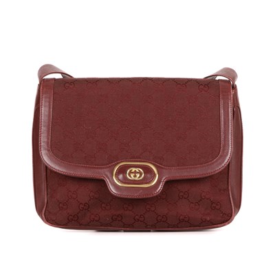 Lot 350 - Gucci, a vintage burgundy handbag, crafted...