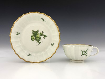 Lot 977 - A Worcester monochrome teacup and saucer,...