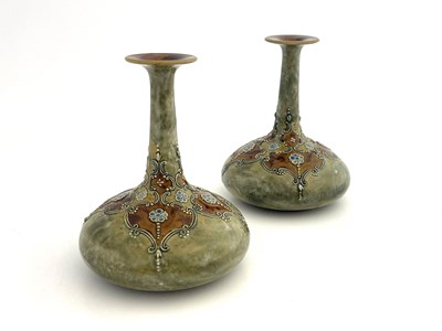 Lot 702 - A pair of Royal Doulton stoneware vases, onion...