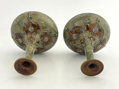Lot 702 - A pair of Royal Doulton stoneware vases, onion...