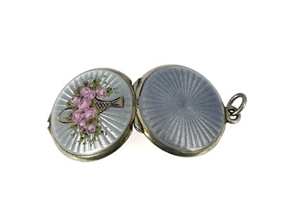 Lot 16 - A silver gilt and enamelled pendant locket,...