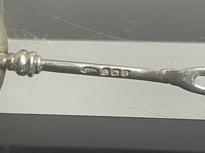 Lot 98 - Winifred King, an Arts and Crafts silver spoon,...