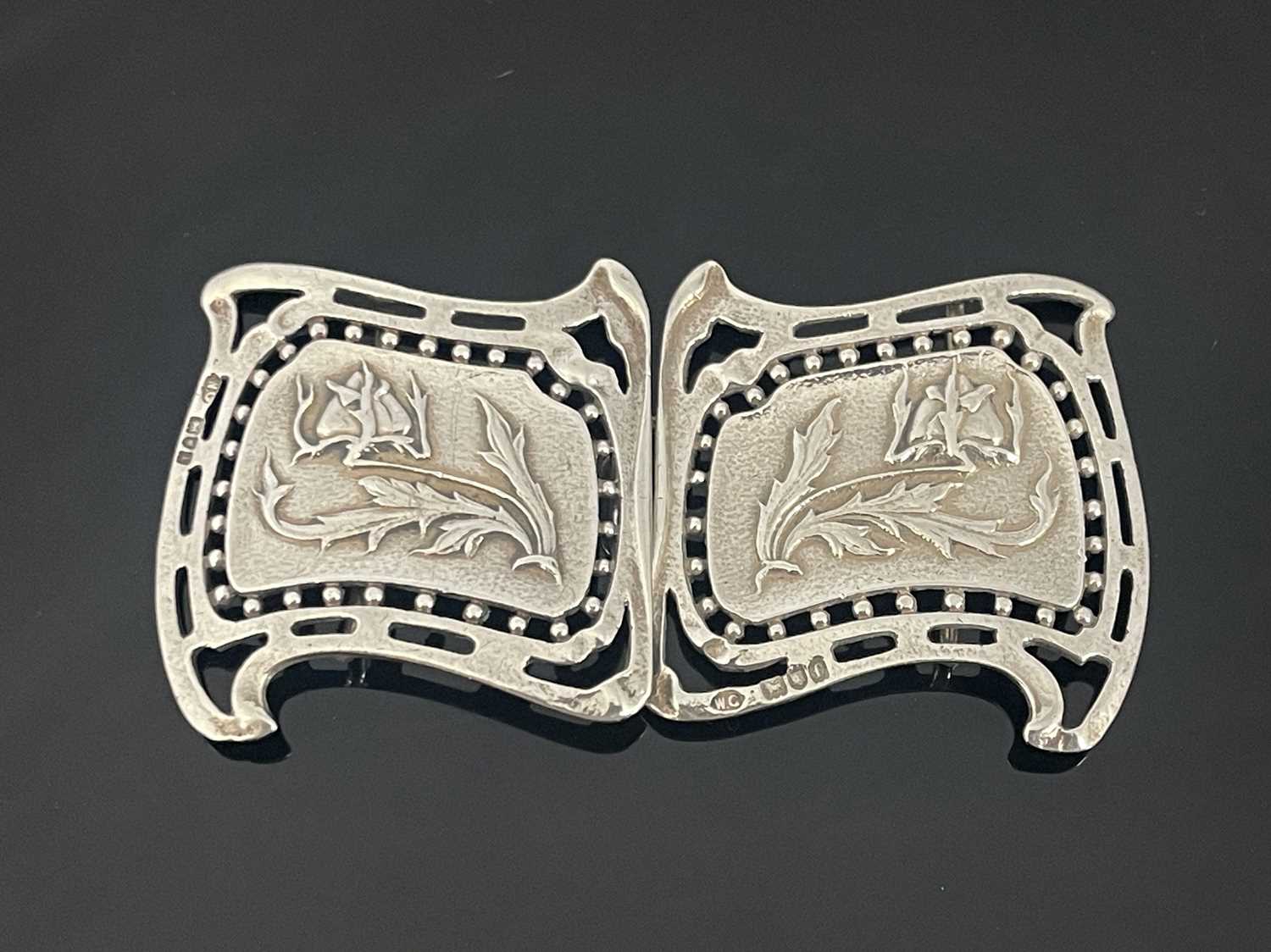 Lot 66 - An Arts and Crafts silver buckle, William...