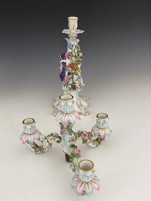 Lot 656 - A pair of Meissen three branch/four sconce...