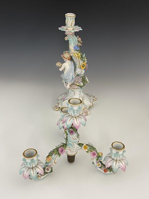 Lot 656 - A pair of Meissen three branch/four sconce...