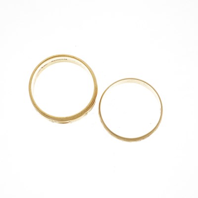 Lot 24 - Two 22ct gold band rings