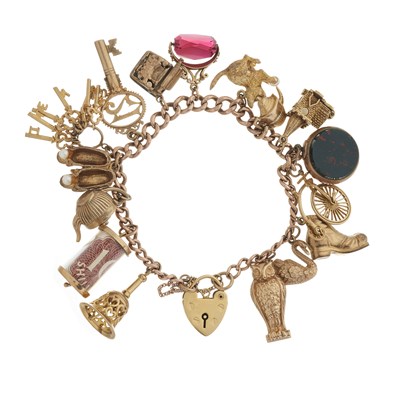 Lot 74 - An early to mid 20th century 9ct gold charm bracelet, with heart-shape padlock clasp