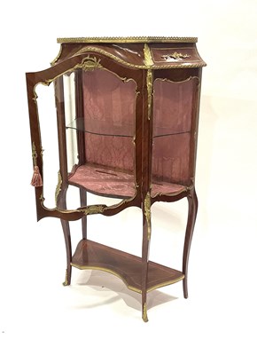 Lot 593 - A kingwood vitrine of Louis XVI design, 20th...