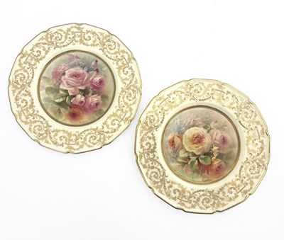 Lot 822 - Charles Hart for Royal Doulton, a pair of rose...