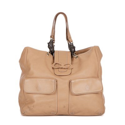 Lot 276 - Anya Hindmarch, a beige leather handbag,...