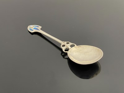 Lot 437 - A George V Arts and Crafts silver spoon,...