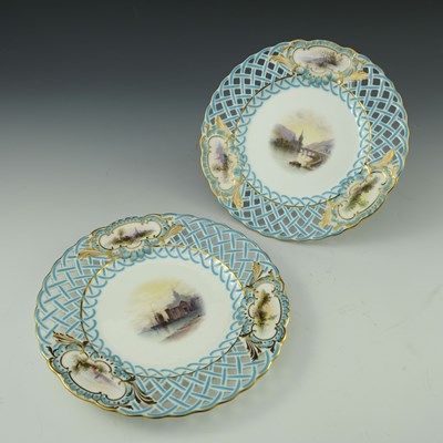 Lot 754 - A pair of Minton reticulated scene painted...