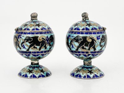 Lot 54 - A pair of champlevee enamelled pedestal silver...