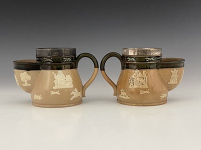 Lot 1030 - A pair of Doulton Lambeth stoneware shaving...