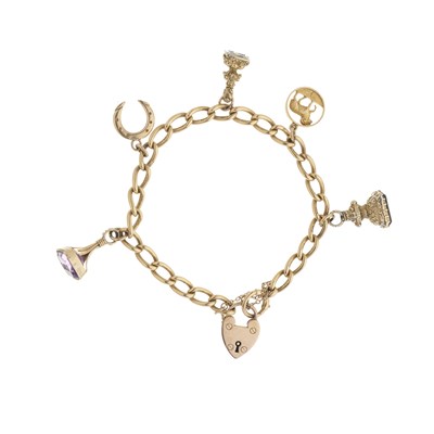 Lot 68 - An 18ct gold charm bracelet, with heart-shape padlock clasp