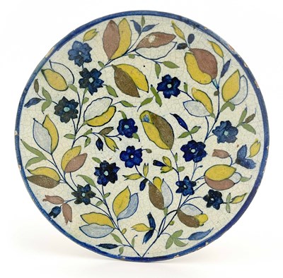 Lot 546 - An Islamic pottery plate, possibly 16th...