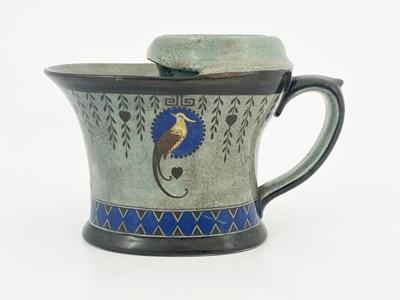 Lot 820 - A Royal Doulton Titanian ware shaving mug,...