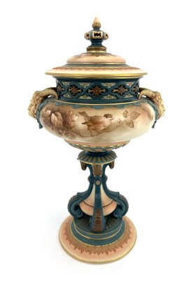 Lot 772 - A Hadleys Worcester pedestal vase and cover,...