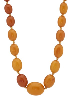 Lot 61 - A graduated amber bead necklace