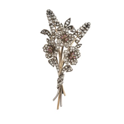 Lot 34 - A late 19th century diamond and ruby floral spray brooch