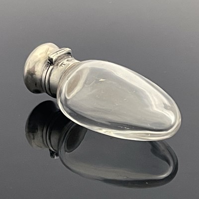 Lot 23 - A Victorian silver-mounted rock crystal scent...