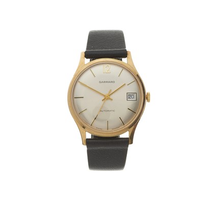 Lot 202 - Garrard, a 9ct gold automatic date wrist watch