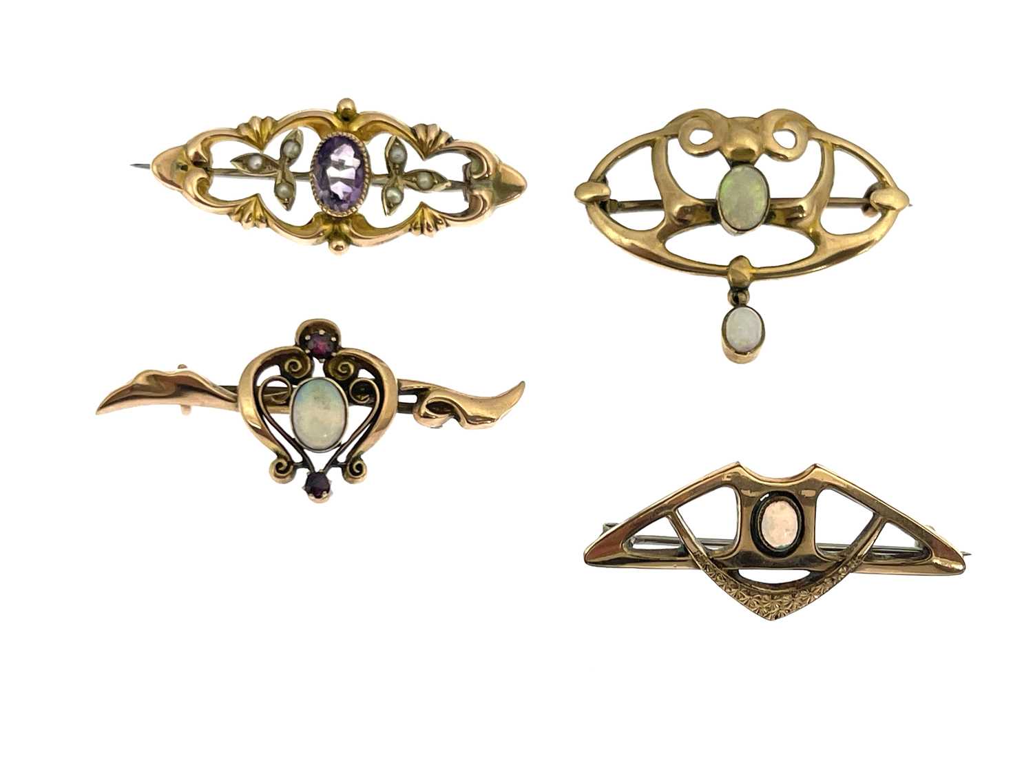 Lot 34 - A collection of four 9ct gold brooches,...