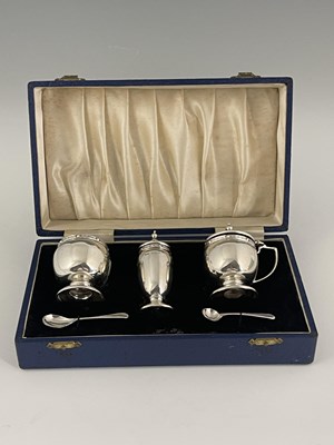 Lot 14 - A George VI silver condiment set, in the...