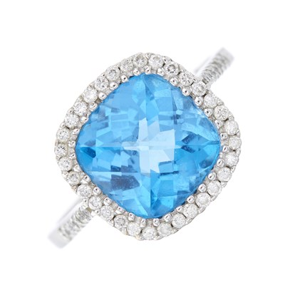 Lot 26 - An 18ct gold blue topaz and brilliant-cut...