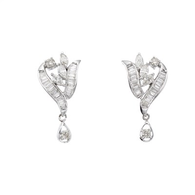 Lot 41 - A pair of vari-cut diamond foliate cluster...