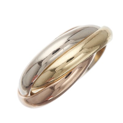 Lot 81 - Cartier, an 18ct tri-colour gold Trinity band...