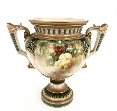 Lot 804 - A Hadleys Worcester pedestal vase, twin...