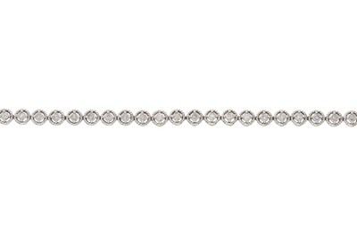 Lot 136 - A gold brilliant-cut diamond line bracelet,...